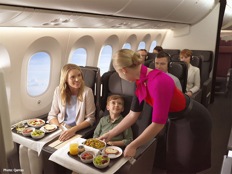 Dining service on Qantas premium economy